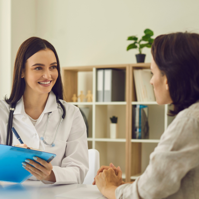 Doctor and patient conversing